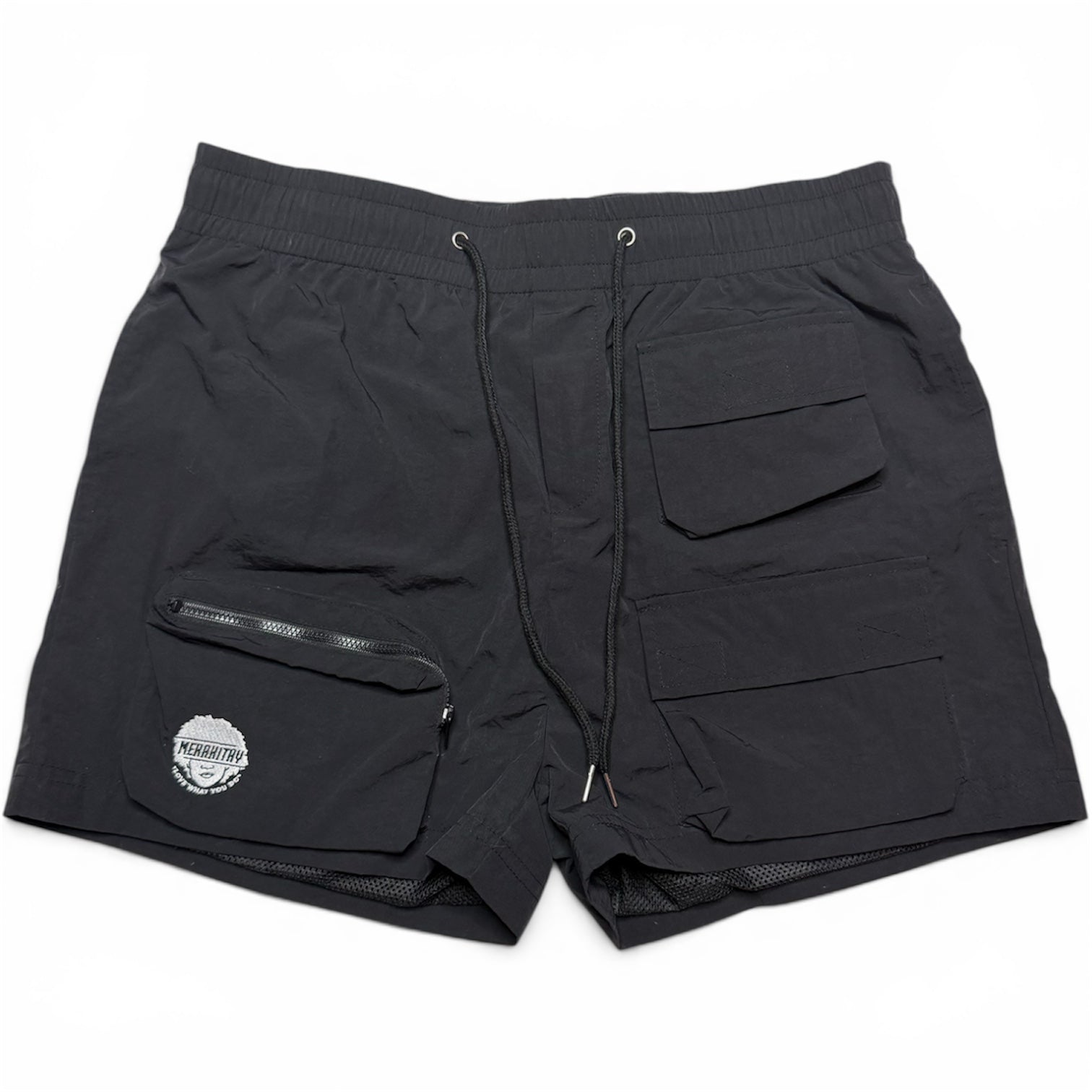 Black cargo 6 pocket swim shorts with an elastic waistband, drawstring, and multiple utility pockets, including a zippered pocket on the left leg with MerakiTay logo.