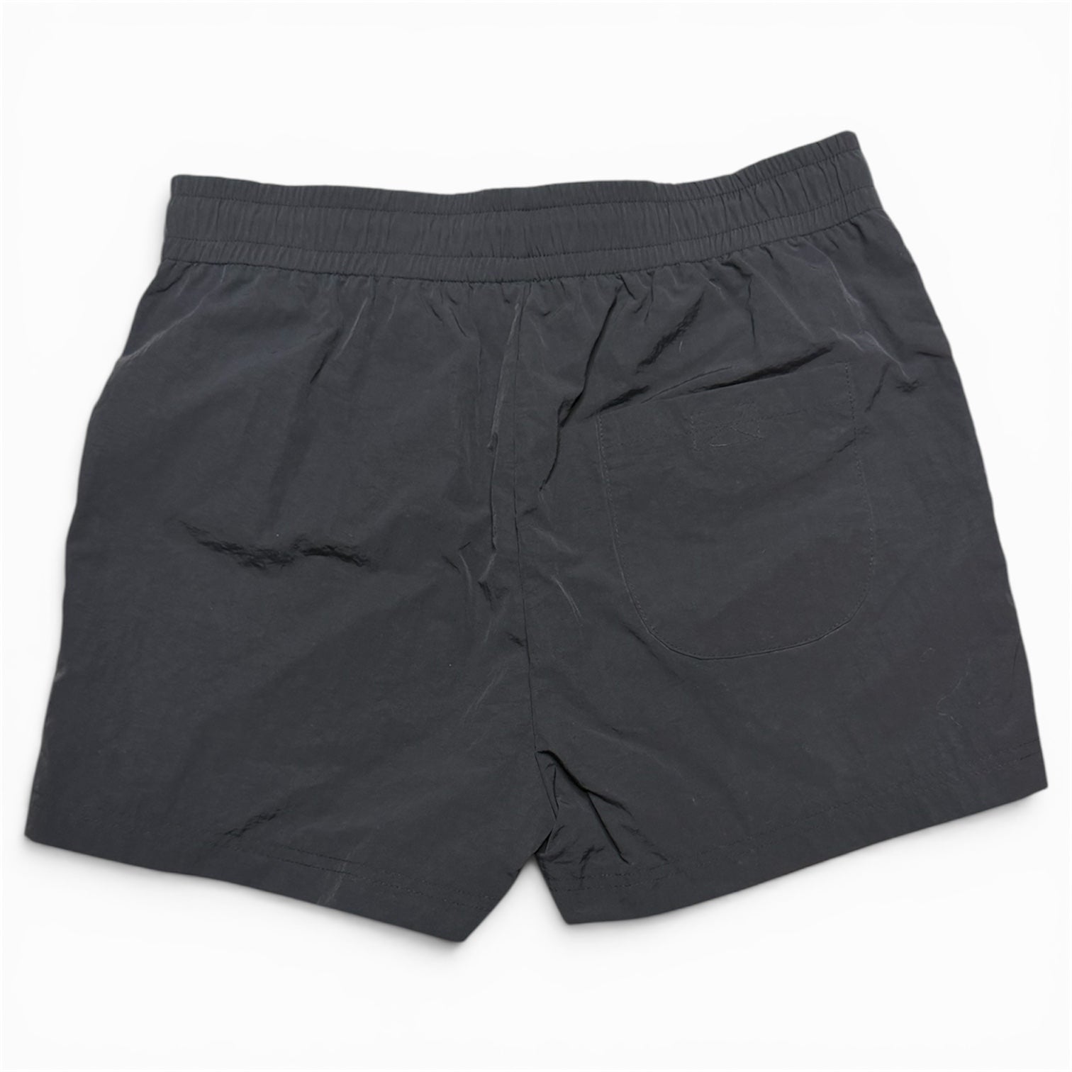 Black cargo 6 pocket swim shorts with an elastic waistband, drawstring, and multiple utility pockets.